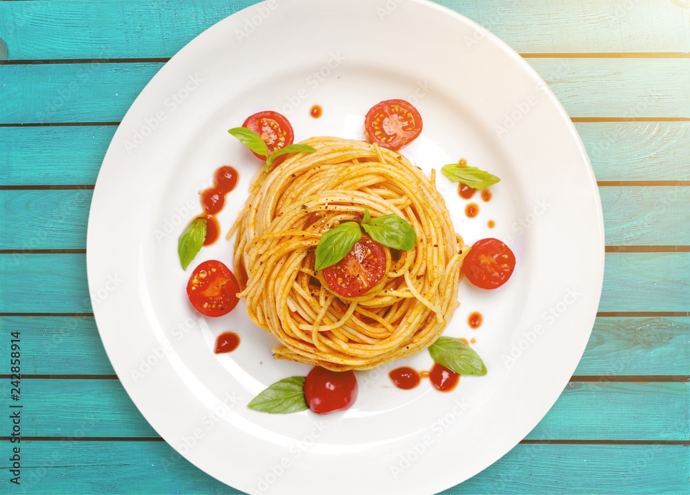 Delicious pasta on white plate on background Delicious pasta on white plate on background