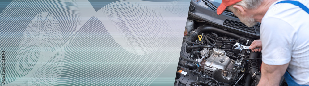 Car mechanic working on car engine. panoramic banner Car mechanic working on car engine. panoramic banner