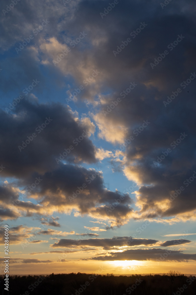 Dramatic sunset with blue sky and clouds