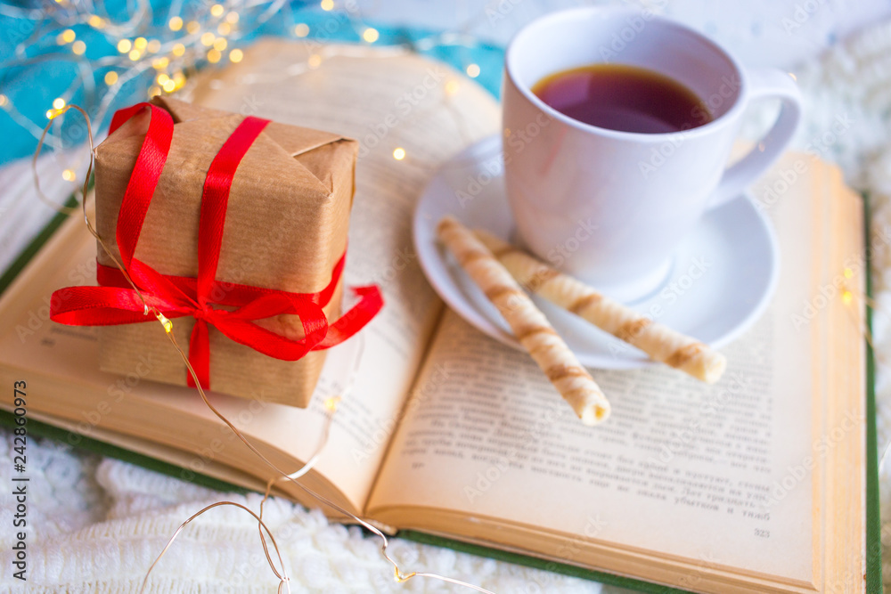 white cup on the book. Romantic breakfast in bed for Valentine's Day or Mother's Day
white cup on the book. Romantic breakfast in bed for Valentine's Day or Mother's Day