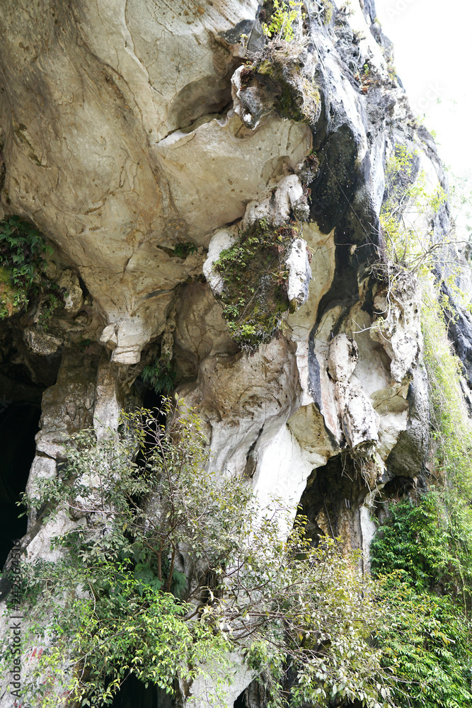 Beautiful natural limestone cave entrance in Malaysia. Limestone Hill