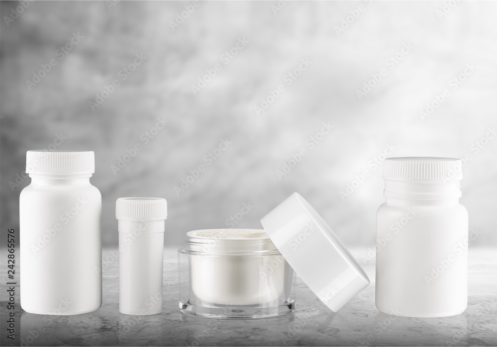 Cosmetic containers isolated on background