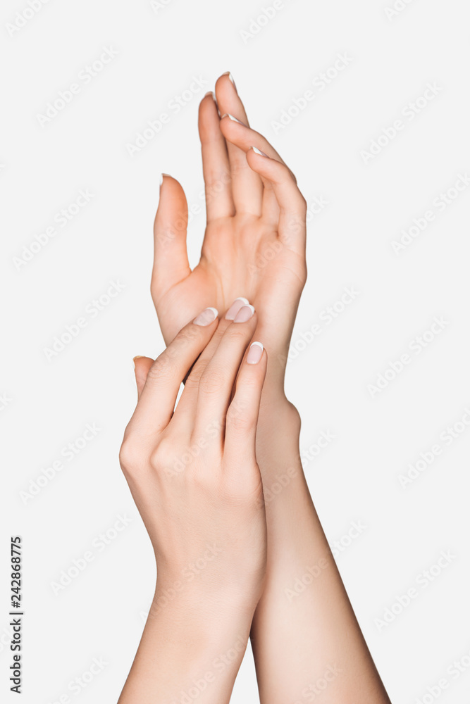 partial view of female hands isolated on white partial view of female hands isolated on white