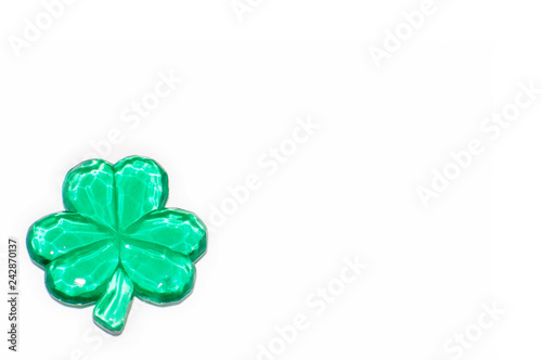 One glass shamrock on white with copy space