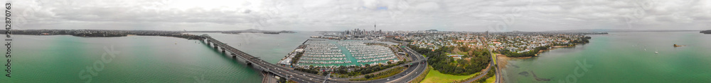 Auckland panoramic aerial view. City bridge and skyline, New Zealand