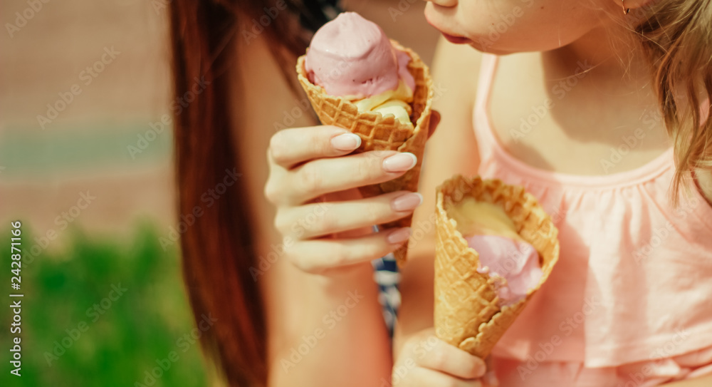 mother with baby eating ice cream close up