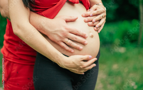 Wallpaper Mural pregnant woman belly Outdoors closeup Torontodigital.ca