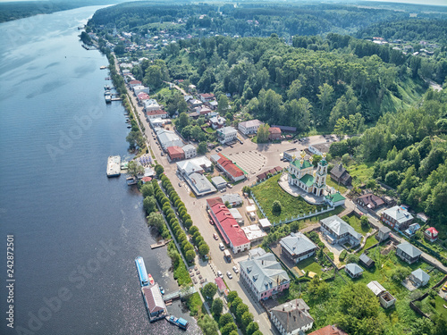 A view of the Volga River from the Levitan Mountain in the autumn Plyos and the Varvara Church photo