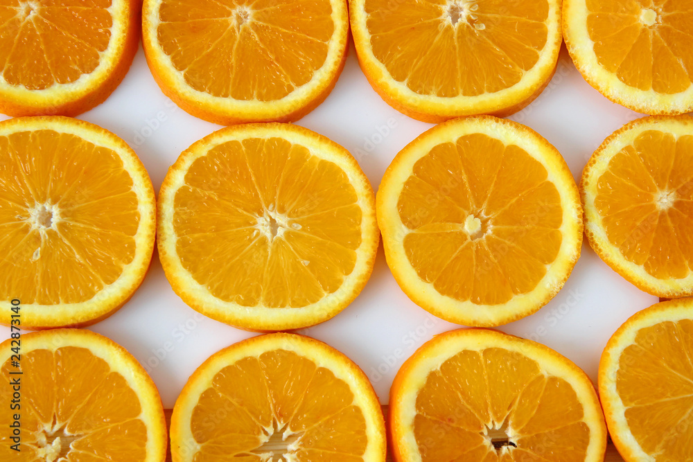 slices of orange on white background slices of orange on white background