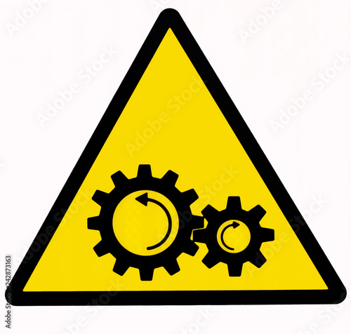 Danger, moving machinery sign .