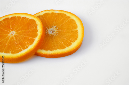 slices of orange on white background