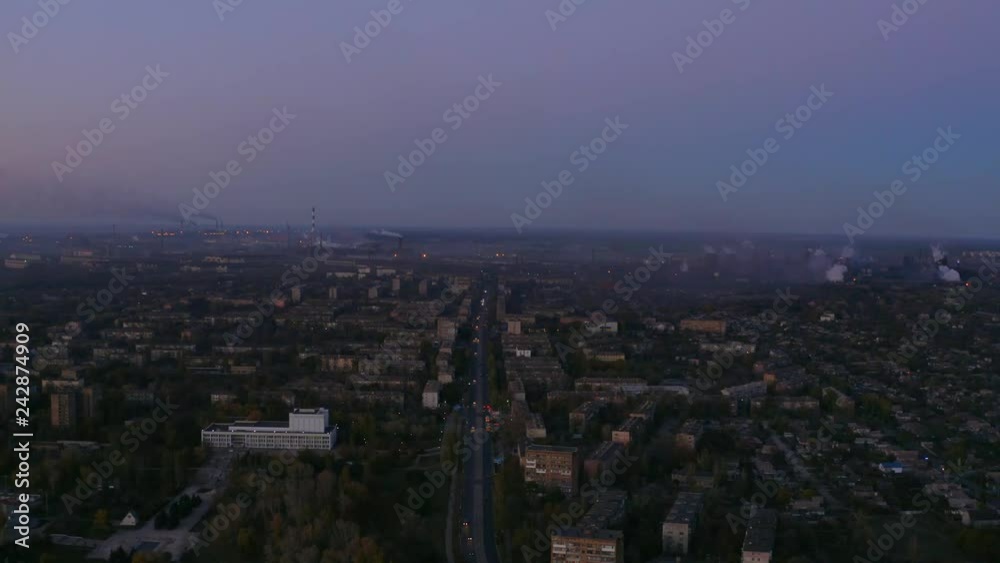 Panaromic aerial view of the city at night. Smog over the city Panaromic aerial view of the city at night. Smog over the city