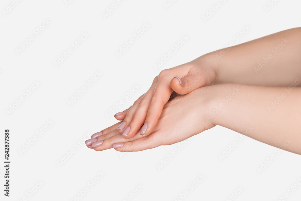 close up view of female hands isolated on white