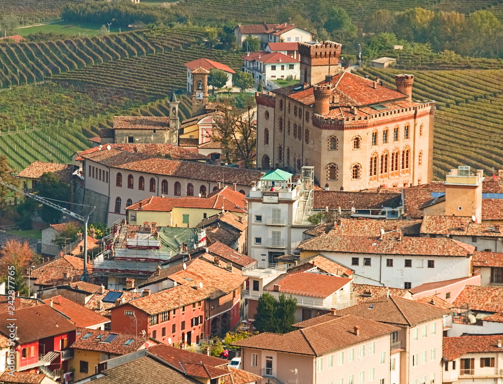 Obraz premium Barolo village seen from above in autumn, surrounded by vineyards in autumn, Langhe region, Piedmont, Italy