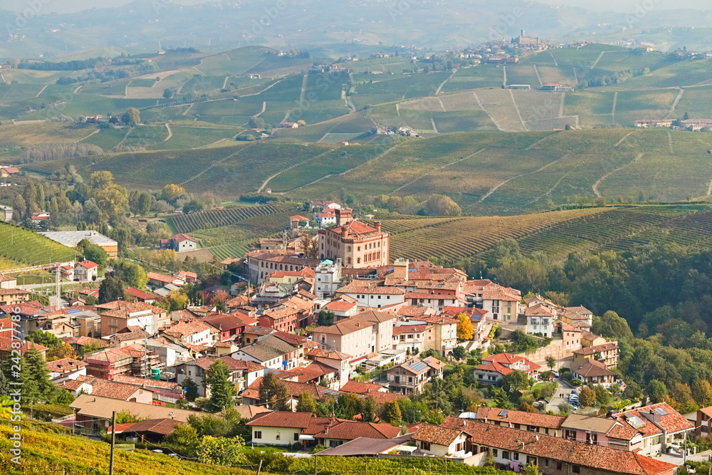 Barolo village seen from above in autumn, surrounded by vineyards in autumn, Langhe region, Piedmont, Italy