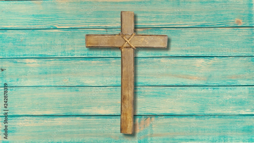 Holy wooden cross isolated on white background
