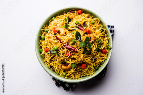 Spicy semiya uppma or upma served in plate. selective focus