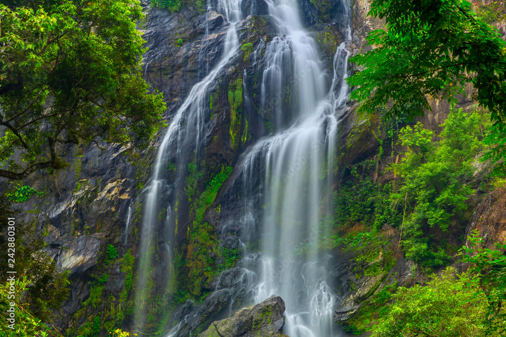 Khlong Lan Waterfall, the beautiful waterfall in deep forest at Khlong Lan National Park ,Kamphaeng Phet, Thailand