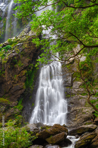 Khlong Lan Waterfall, the beautiful waterfall in deep forest at Khlong Lan National Park ,Kamphaeng Phet, Thailand,