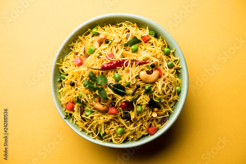 Spicy semiya uppma or upma served in plate. selective focus