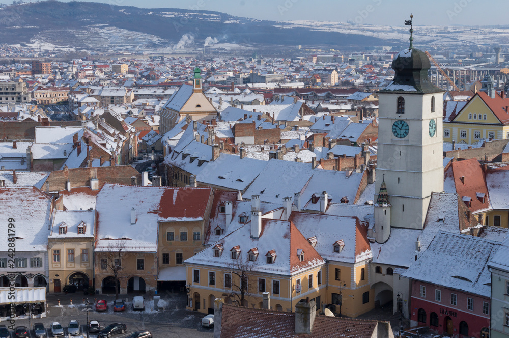 Aerial view from Saint Mary Lutheran Cathedral in Sibiu city in Romania with Council Tower. City also known as Hermannstadt
