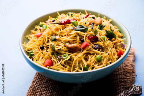 Spicy semiya uppma or upma served in plate. selective focus