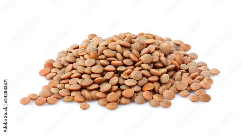 Pile of uncooked lentils isolated.