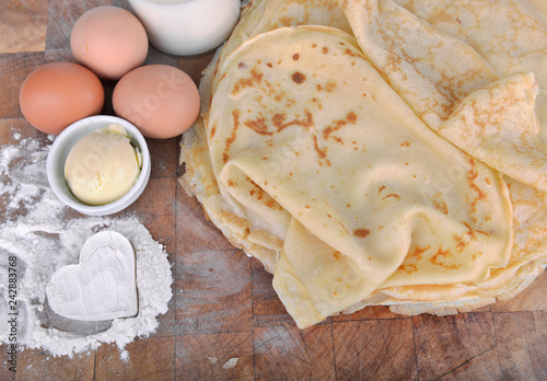 Bilde på lerret homemade french pancakes with  ingredient and heart shaped in the flour  on a pl