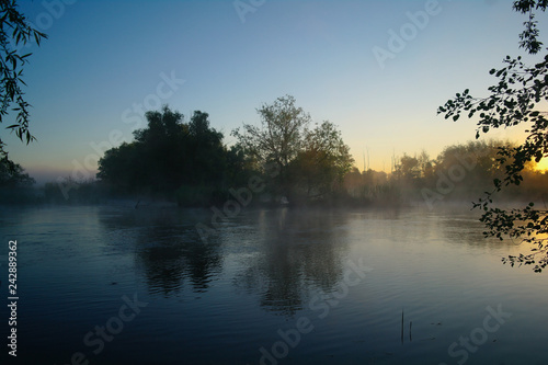 Obraz na płótnie Morning landscape with fog on the river w salonie
