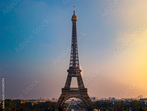 eiffel tower in paris at sunset © Egkarach