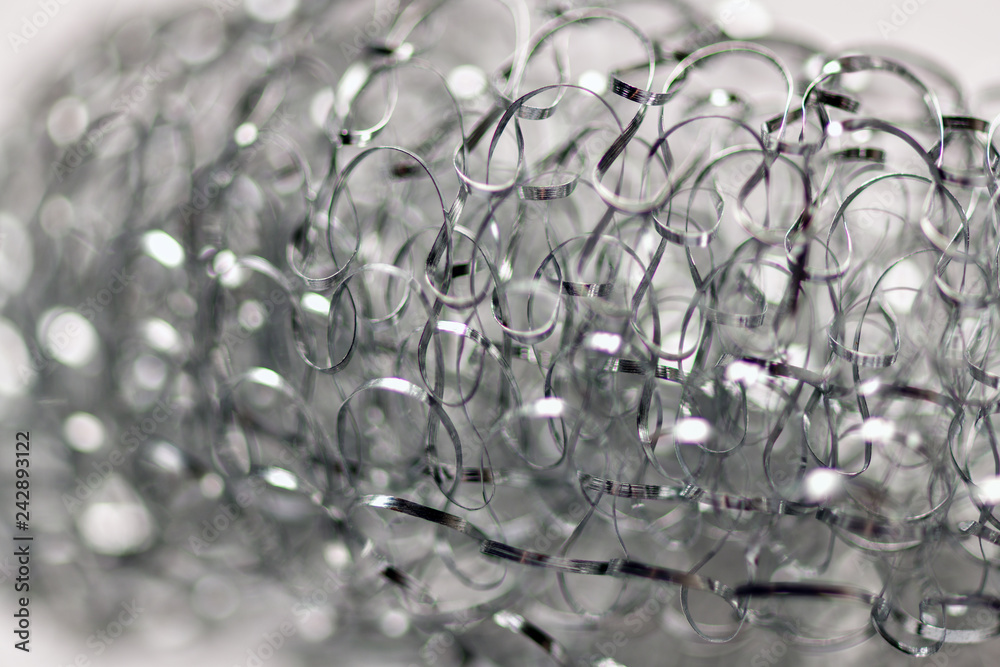 Iron hard brush very close. A lot of iron weaves and rods. Macro photography. Iron hard brush very close. A lot of iron weaves and rods. Macro photography.