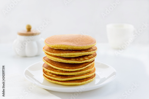 American pancakes on a white plate
