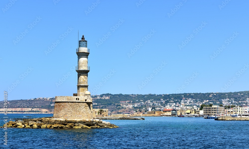 the Venetian lighthouse guards the  harbour of Chania