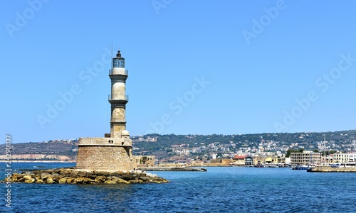 the Venetian lighthouse guards the harbour of Chania