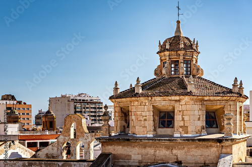 Church tower and cityscape in Almeria, Spain.