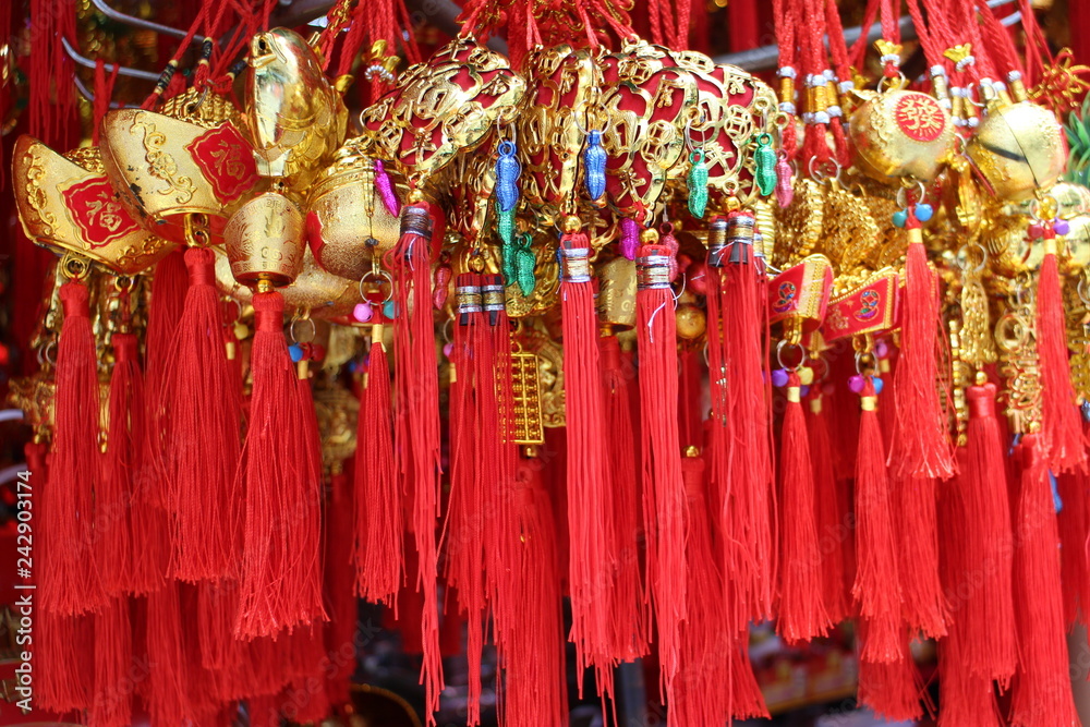 Chinese Gold Lucky Charm with Red Tassel for Good Luck Stock-Foto | Adobe  Stock