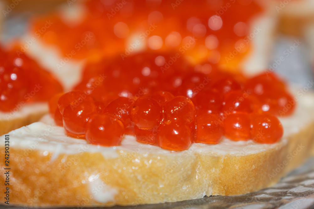 Red caviar and parsley sandwiches on New Year's table Red caviar and parsley sandwiches on New Year's table