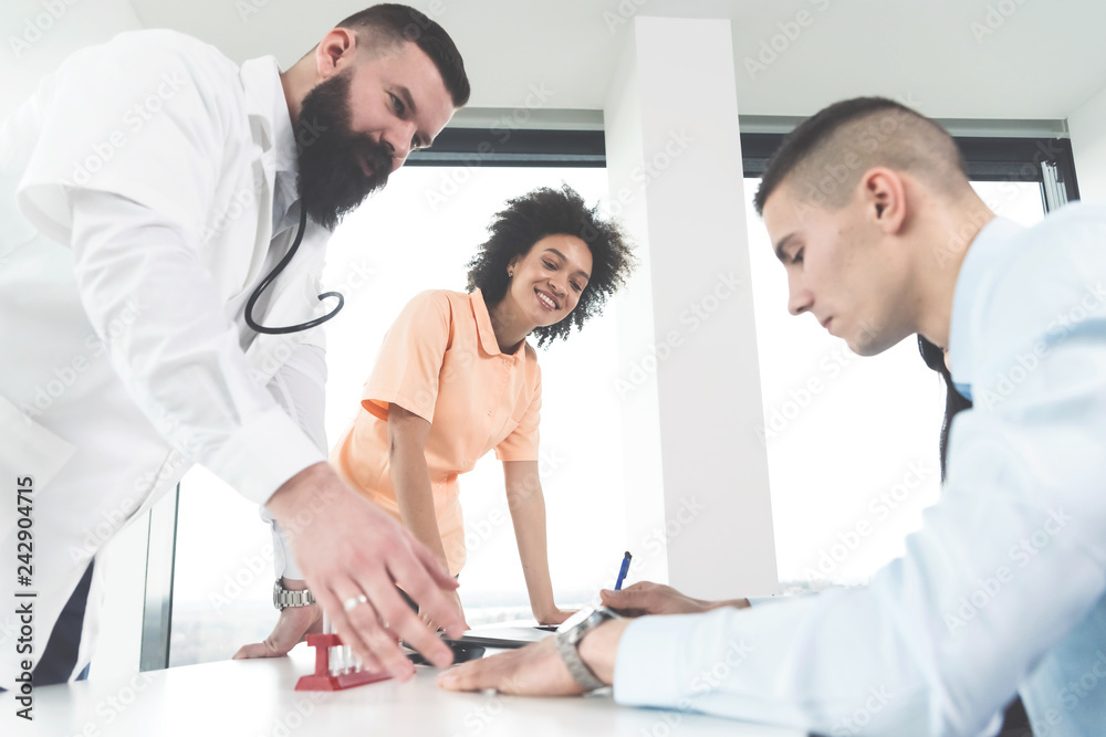 Fototapeta premium Patient signing the medical forms