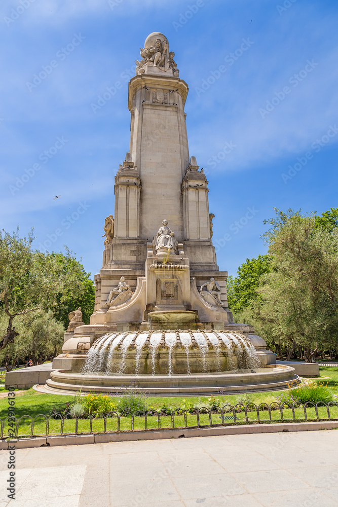 Madrid, Spain. The reverse side of the Cervantes memorial: a sculpture of Queen Isabella of Portugal, a fountain with the emblems of Spanish-speaking countries