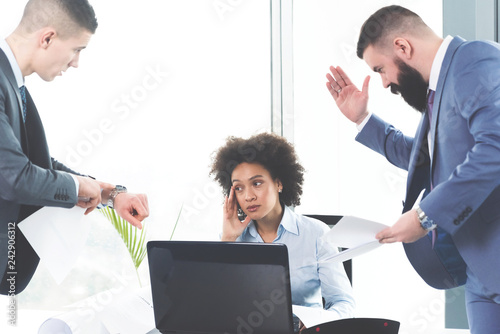 Businesswoman is stressed and anxious about a deadline
