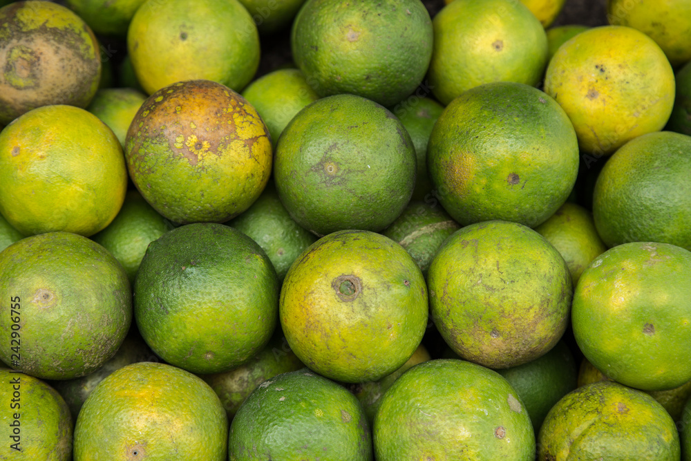 Fresh fruit green tangerine tamarin closeup view Fresh fruit green tangerine tamarin closeup view