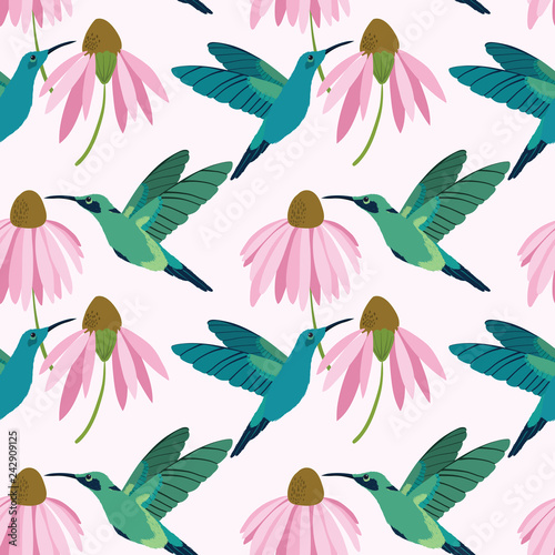 Vector colorful hummingbirds seamless pattern on light pink background.