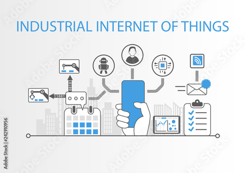 Industrial internet of things concept with hand holding modern bezel free smart phone
