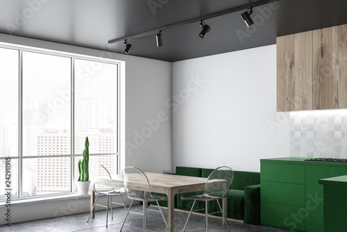 Green sofa kitchen corner