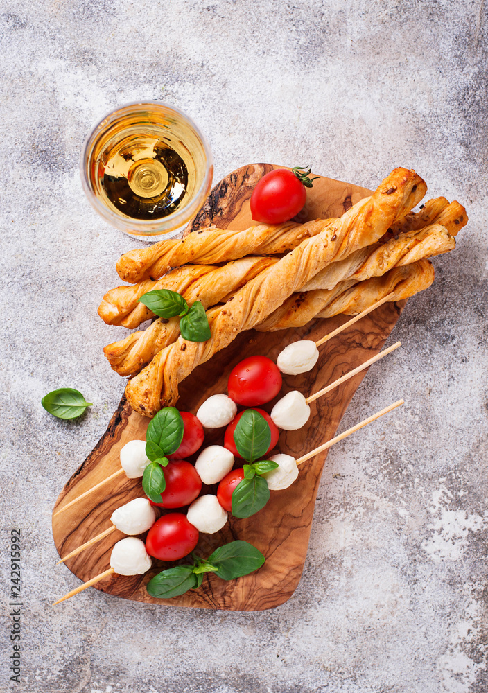 Caprese skewers and grissini bread Caprese skewers and grissini bread