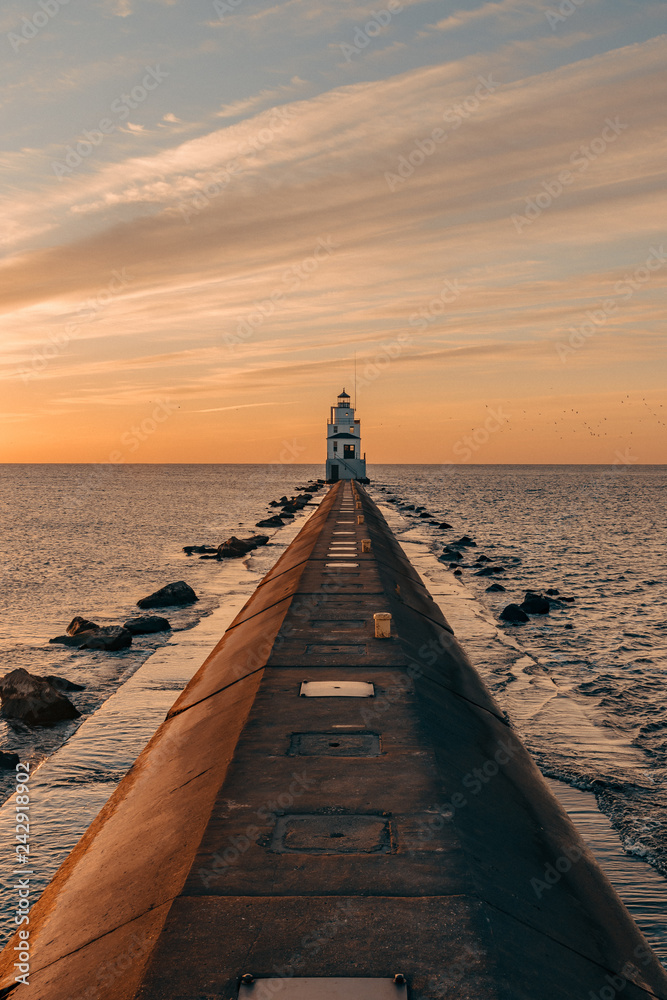 lighthouse pier at sunrise
