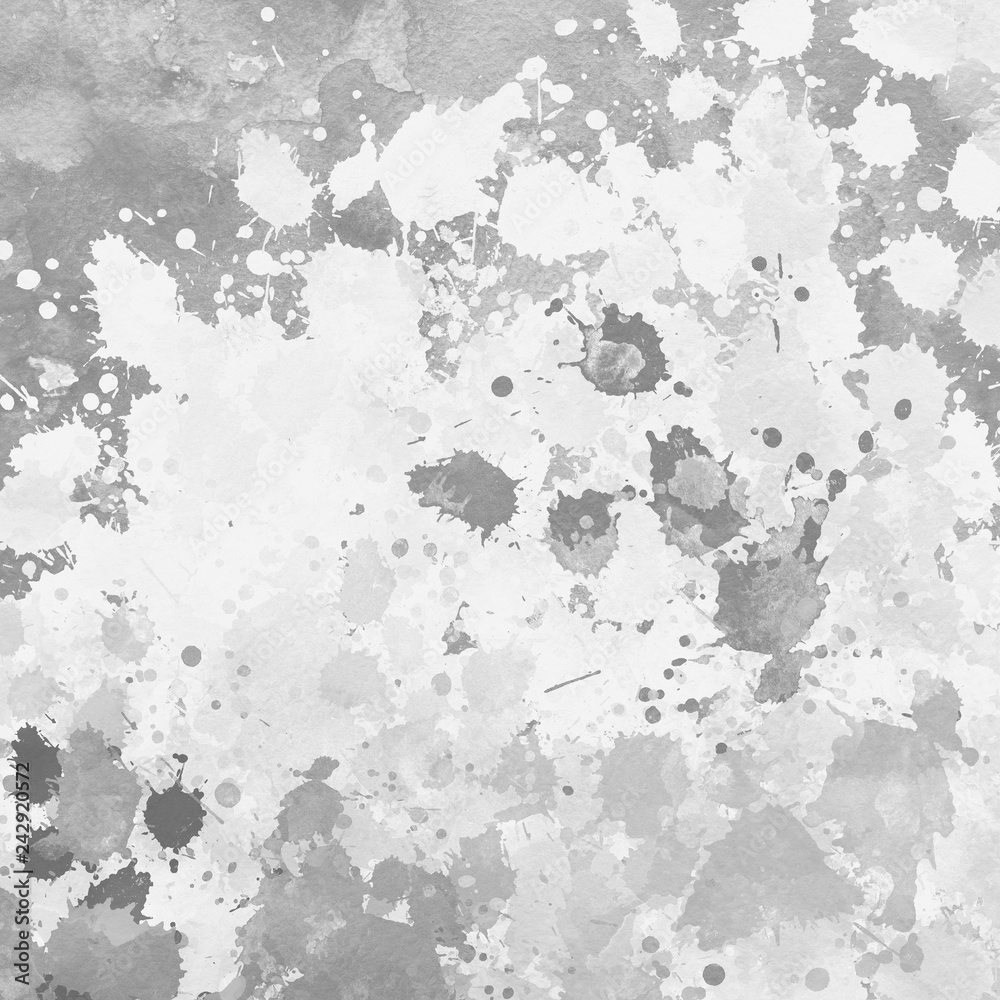 Gray paint splatter effect texture on white paper background. Artistic backdrop. Different paint drops.