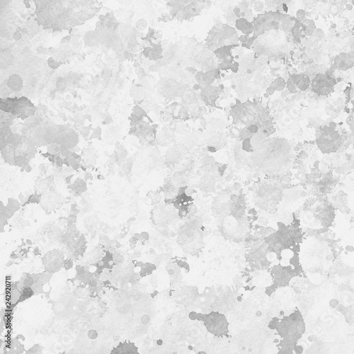 Gray paint splatter effect texture on white paper background. Artistic backdrop. Different paint drops. © artistmef