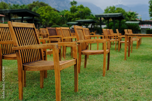 wooden chairs arranged as a cinema hall outdoors at a hotel in Turkey