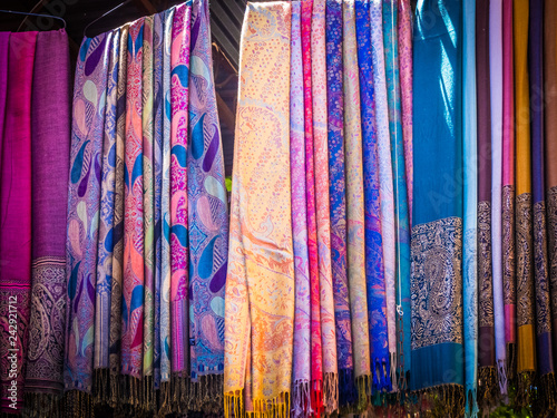 Traditional Colorful Moroccan scarves and shawls, Morocco also known as shesh (touareg turban). Handmade fabrics. Souk. scarfs market of the old medina in vibrant colors